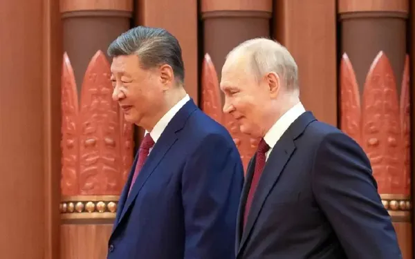 Si və Putin Pekində görüşüb